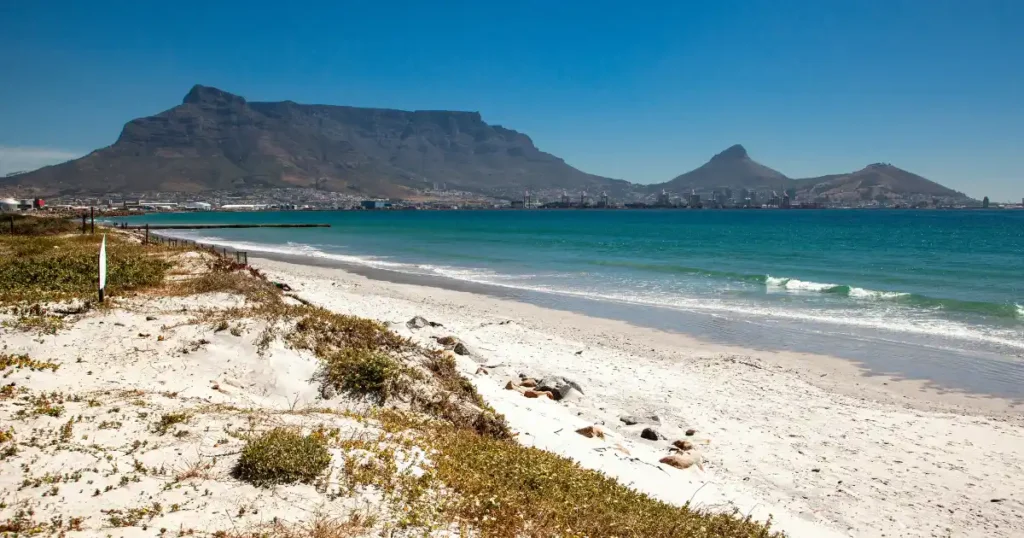 Scenic view of Table Mountain from the beach in Cape Town, consistently ranked among the best places to go in december.