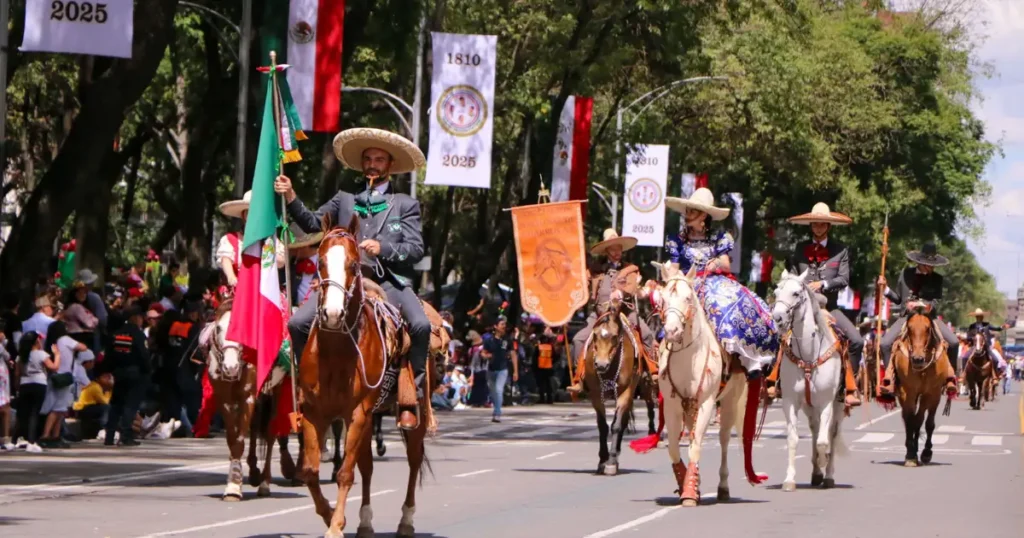 Traditional Mexican parade featuring horseback riders, showcasing why it is among the top places to visit in december for local culture.