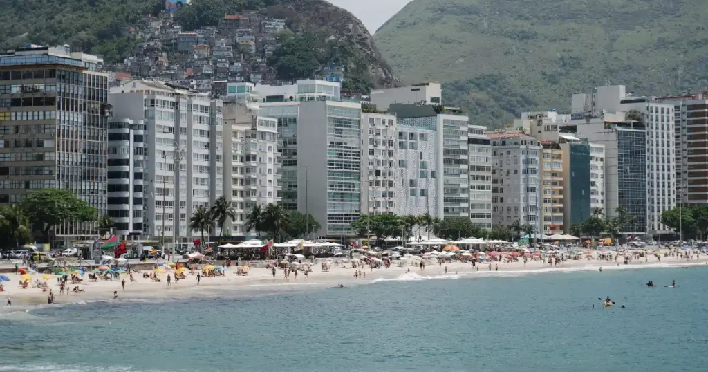 Sunny Copacabana beach in Rio, a lively hot place to go in December.