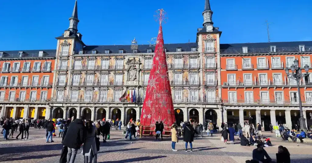 Red Christmas tree at Plaza Mayor in Madrid, Spain, one of the best countries to visit in december